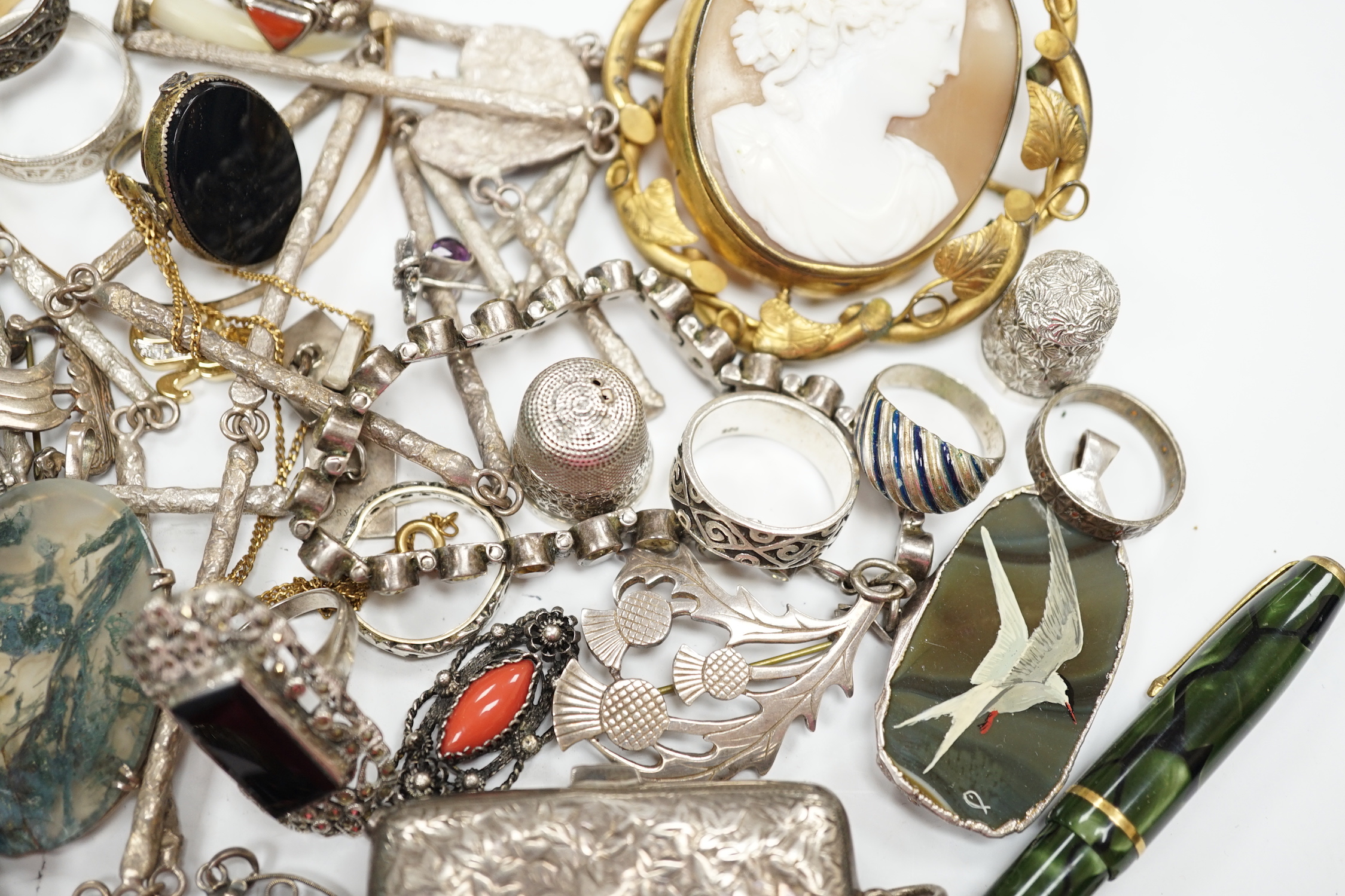 A quantity of assorted mixed silver, jewellery and other items including a sterling and enamel drop pendant, coral, silver brooches, Norwegian sterling and enamel flower brooch, fountain pen, pencils, cufflinks, silver s